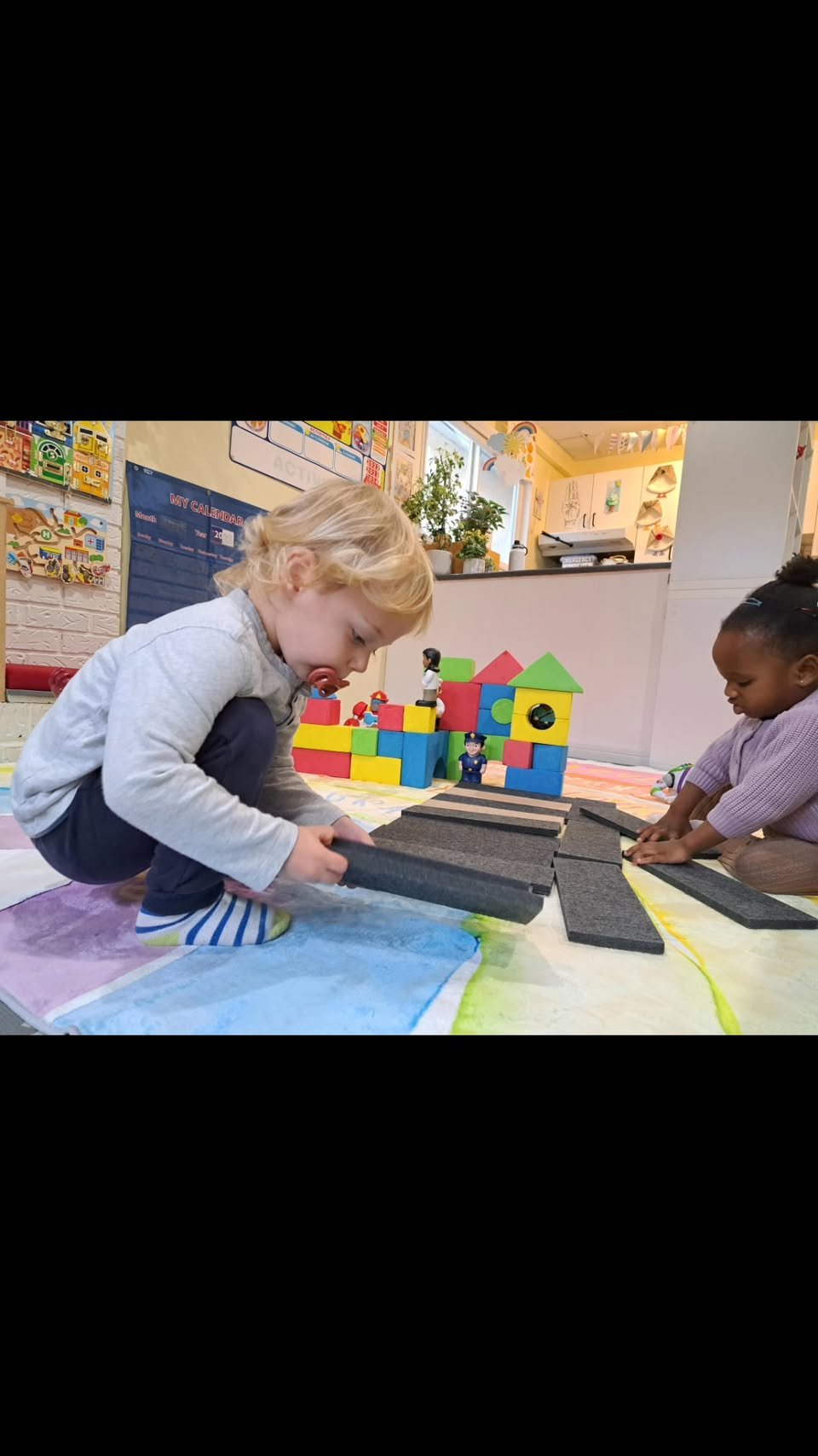 Children building with soft blocks