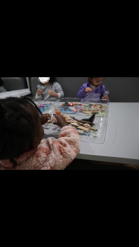 Sensory bin activity with ice and animals