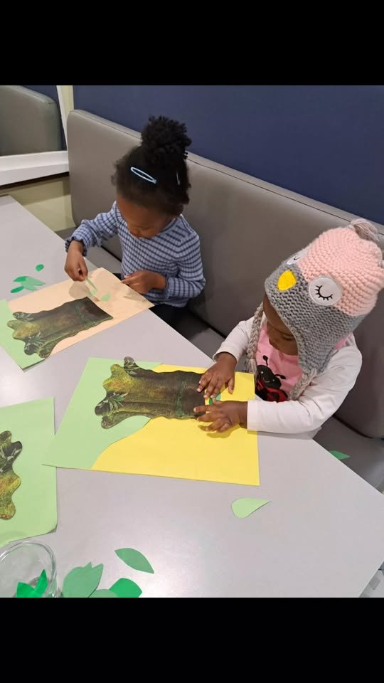 Children doing autumn tree crafts