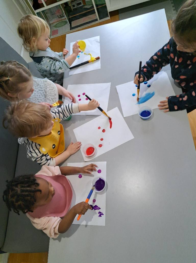 Kids having fun with watercolor painting